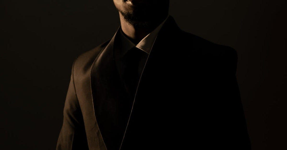 Moody portrait of man in dark suit — premium gift